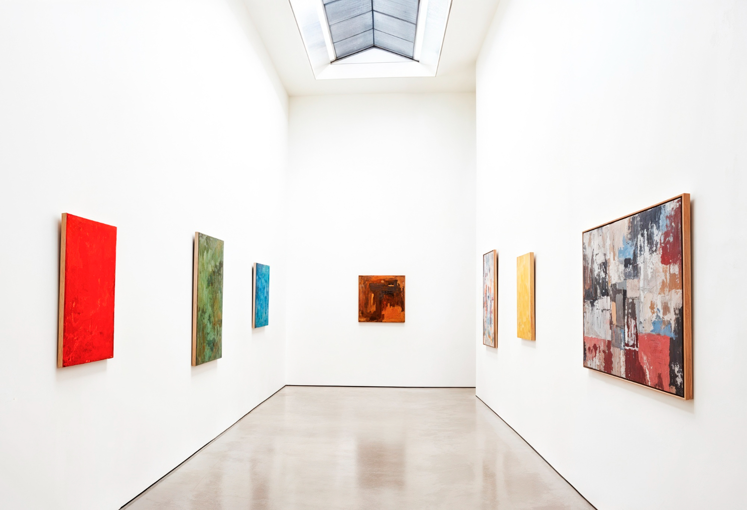 Bright contemporary art gallery with colorful abstract artworks, an example of a creative space.